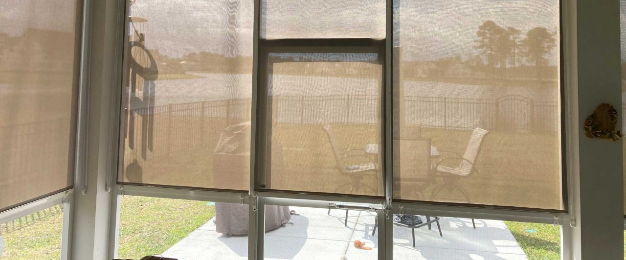 Covered patio with sheer blinds